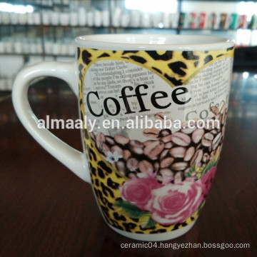 white porcelain coffee cup with custom designs